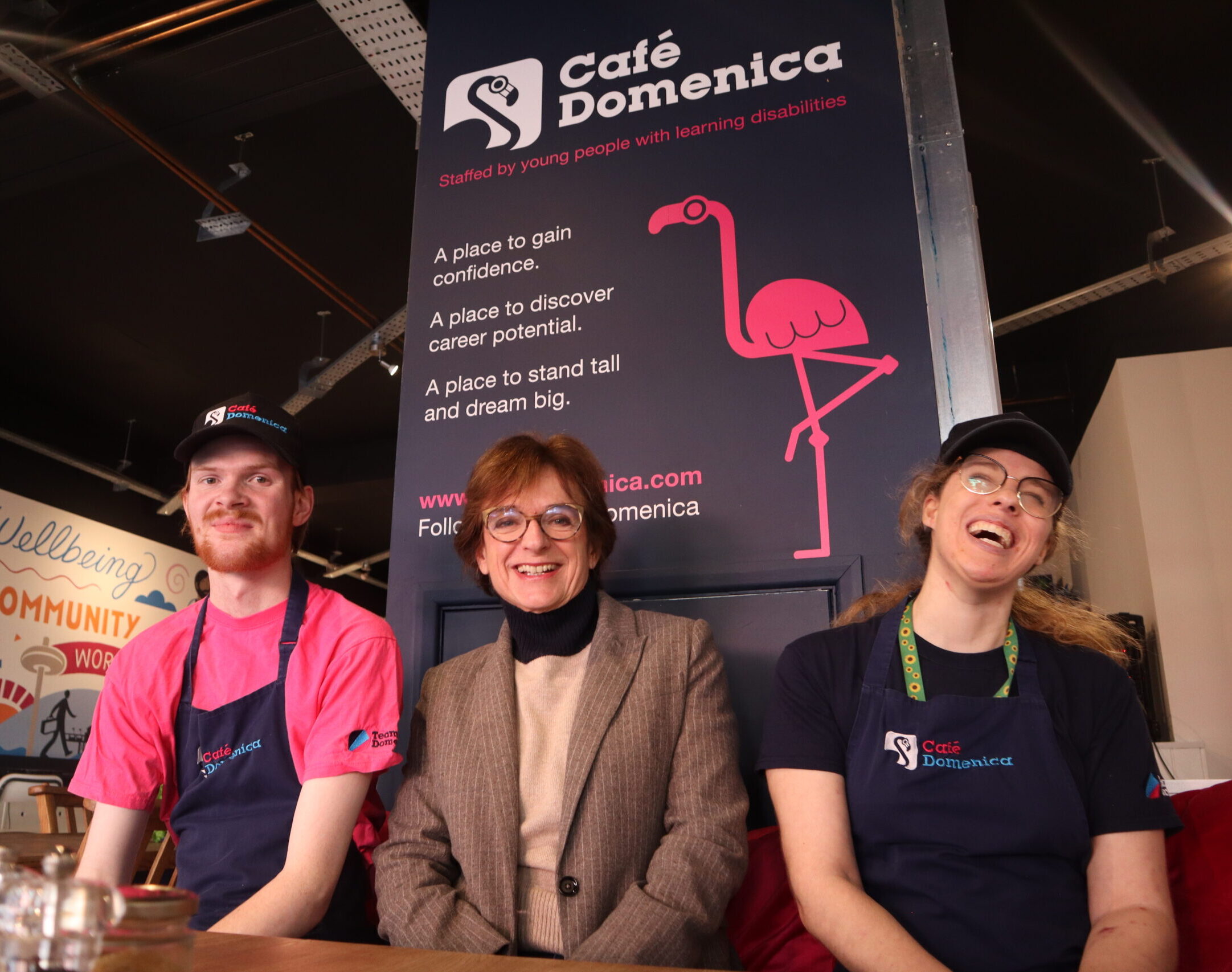 Rosa Monckton sat laughing with the candidates she supports at Team Domenica