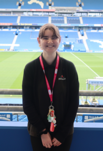 Ella at her job at Sodexo in the Amex stadium.