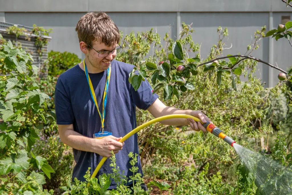 Team Domenica Candidate Max on his work placement at Brighton College as part of the gardening team