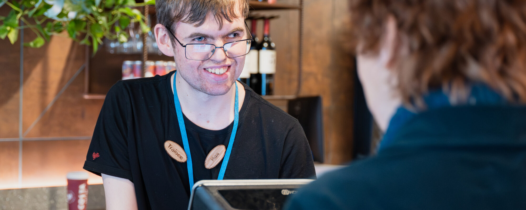 Team Domenica candidate Max serving a customer at Nando's.
