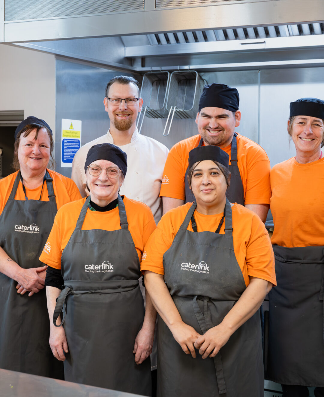 Teejay with Caterlink team at Hove Junior School