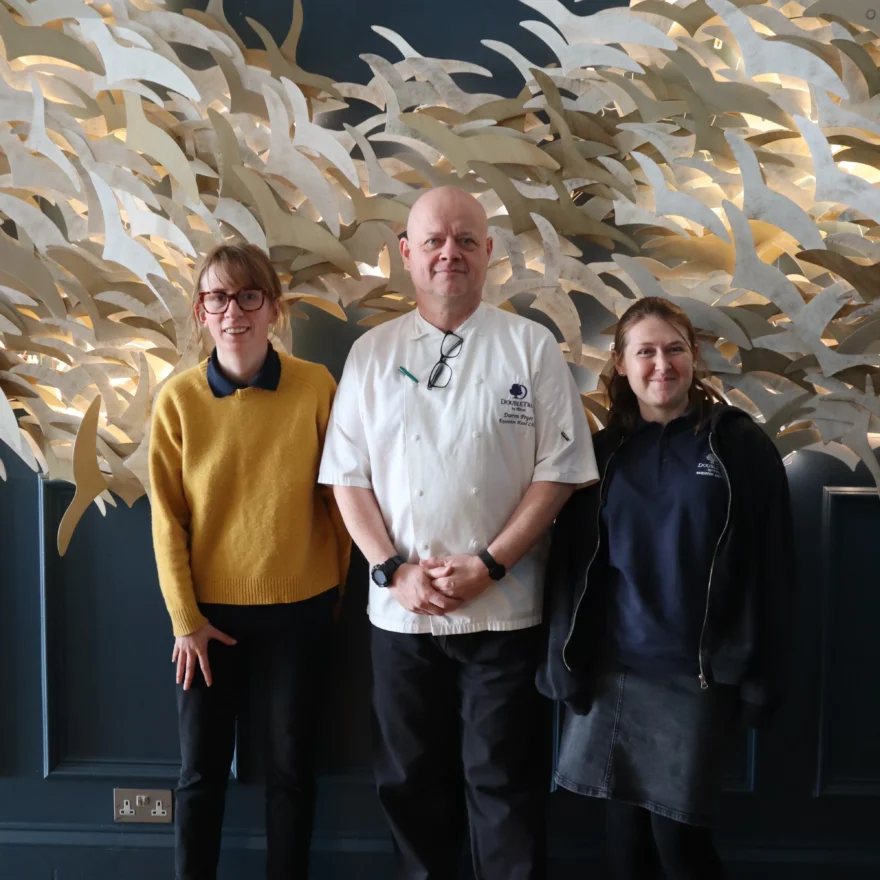 Two Team Domenica candidates with chef